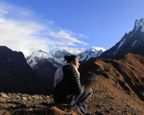 Trekker Enjoying Sunbath At Mardi Himal Trek